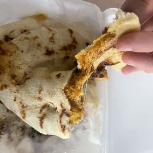 Very stuffed and cheesy pupusas.