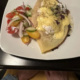 Ham and cheese crepes with poached egg and hollandaise sauce