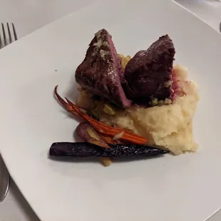 Bison Strip Loin, Green Garlic Butter, Roasted Carrots, Fava, Yukon Puree