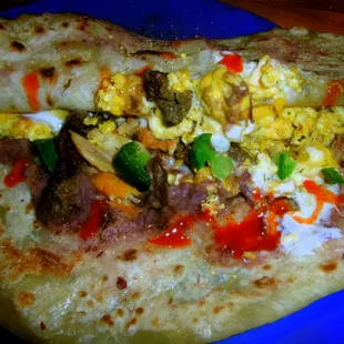 The tasty contents of an Honduran baleada