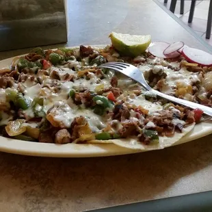 Alambres plate. choose 3 toppings. it&apos;s like tacos over topped with deliciousness