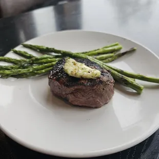 a steak and asparagus