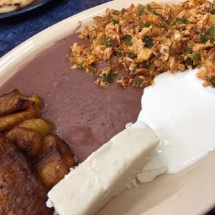 Chorizo plate with beans and planto and cheese with cream. Awesome!!!