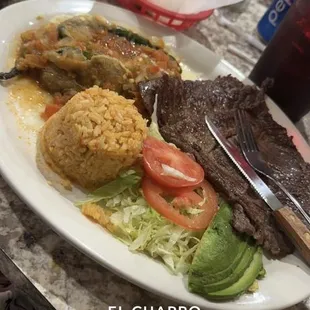 This is the #8.   It&apos;s a stuffed poblano pepper with a skirt steak, rice, charro beans, avocado and homemade flour tortillas!