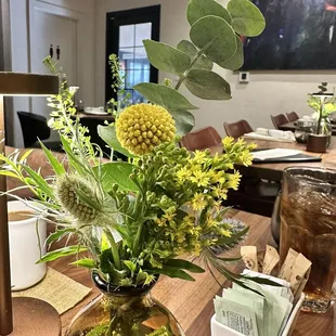 Flower arrangement on table