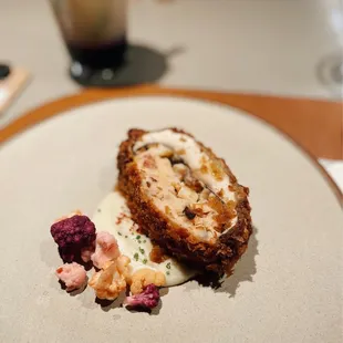 September 2022 -- Buhseot shrimp jeon Portobella stuffed with shrimp mousse, salami and celery root. Served on sharp cheddar mornday