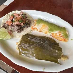 Judy&apos;s Combo - chicken tamale, enchilada of choice, steak taco