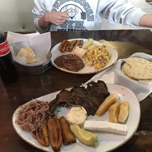 Desayuno plate and a carne asada. Handmade tortillas were delicious. Central American sodas and drinks! Loved this place!!