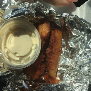 Tamale frito con crema