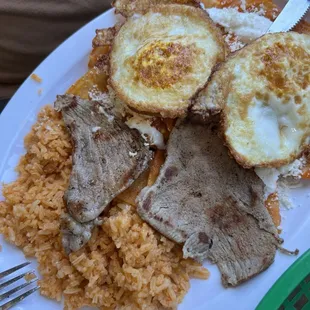 Chilaquiles with eggs and steak