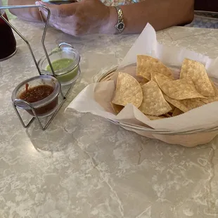 Complimentary chips and salsa super spicy sauces they were great