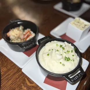 Sauted lobster and Creole Cream Cheese Potatoes, creamy and smooth! Black truffle butter in the white square container.