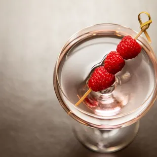 raspberries in a martini glass