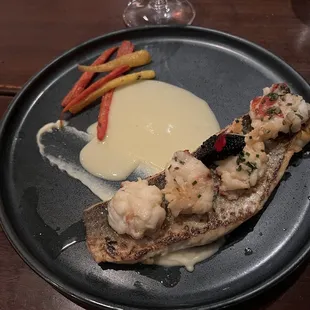 Matagorda Bay Redfish with butter poached lobster tail
