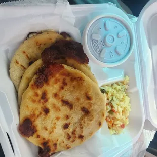 a meal in a styrofoam container
