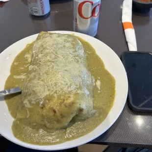 Chili Verde Burrito w/ chili verde sauce on top.