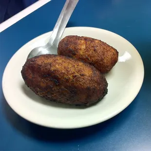 An after order of dos empanadas de leche.