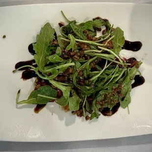 Beet, strawberry, Arugula, goat cheese and pecan salad