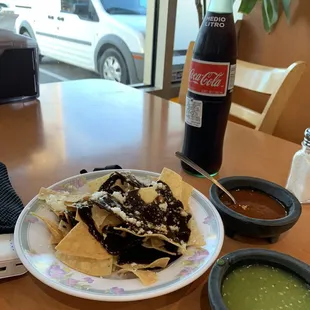 They welcomes you with chips and salsa; some how they surprised me with mole on top! I am very pleased with the premium service.