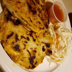 Pork and cheese pupusas with slaw