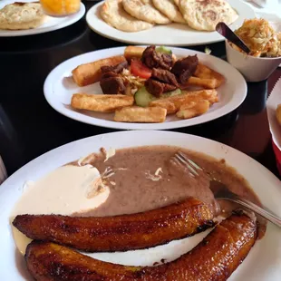 Platanos Fritos yucca con chicharon and the famous pupusas