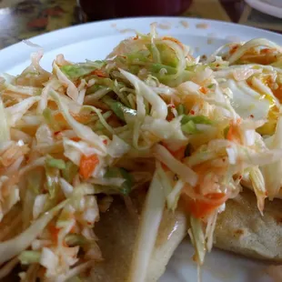 If you are tired of the same old boring breakfast offerings around town, get some pupusa's &amp; top them with eggs. Pretty freaking fantastic!