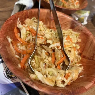 a wooden bowl of sauerkraut