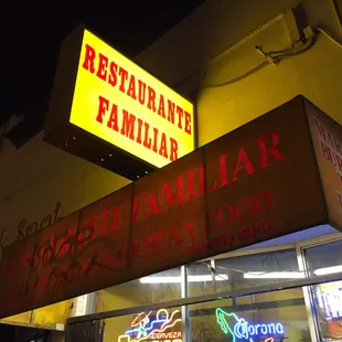 a neon sign for a restaurant