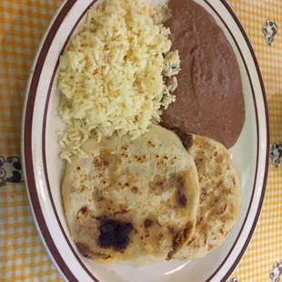 Two pupusas, rice and beans
