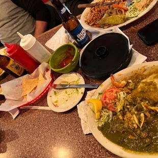 a table full of mexican food