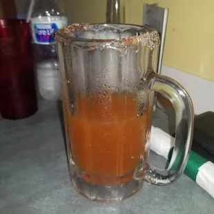 Michelada, chicken fajitas, and chicken flautas