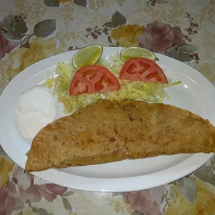 Home made Steak
Quesadilla 
Quesadilla hecha a mano de Carne Asada