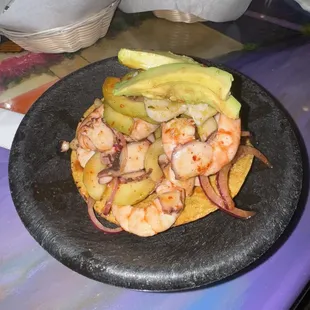 shrimp and avocado on a tortilla