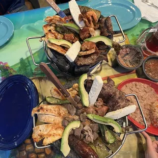 Top: Molcajete Mixto Bottom: Molcajete de Carnes