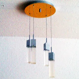 a clock hanging from the ceiling