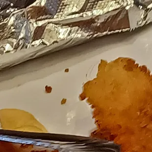 a piece of fish on a plate