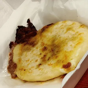 Pupusa Mixta - Pork, Cheese, and beans.  Comes with two.