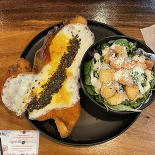 Milanesa Provoleta (Chimichurri and Provolone) and Caesar Salad.