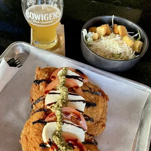 GTFO with this amazing Milanesa Capressa (with a side Ceasar Salad)