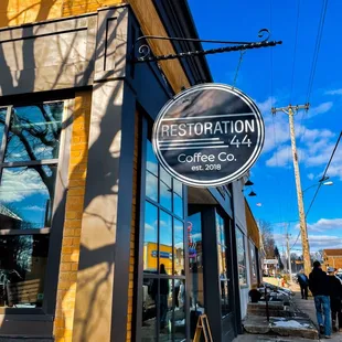 a sign for restoration coffee co