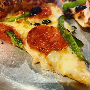 Pepperoni pizza with pepperoni and green onions