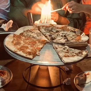 4 pizzas down to a few slices left &amp; cake !!!