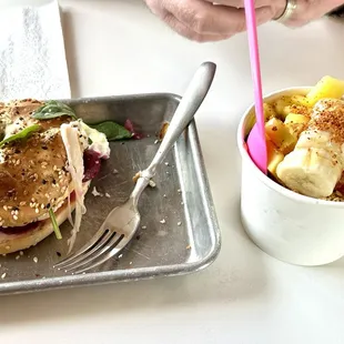 A portion of our breakfast: Unbeetable breakfast sandwich on left and yummy açaí bowl on the right.