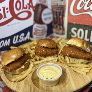 a plate of hot dogs and french fries