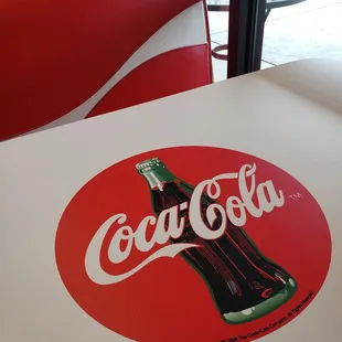 coca cola tables but it's pepsi-only products at the fountain... lol