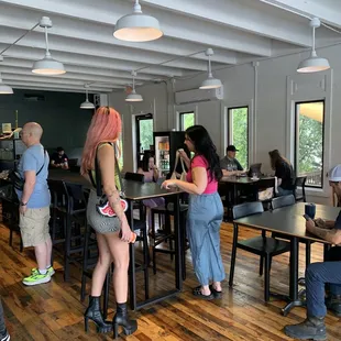 a group of people in a cafe