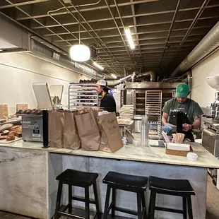 people working in a bakery