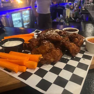 Wings with buffalo and sweet chili sauce in the side because I don't like mine tossed.