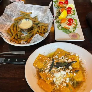 Butternut squash ravioli, battered green beans, walleye cakes.