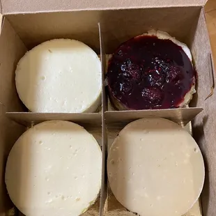 4 small 3" cheesecakes (key lime, passion fruit, mocha, lemon mezcal with blackberry molasses topping)